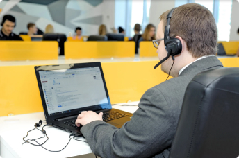 Customer support specialist on a call with a client