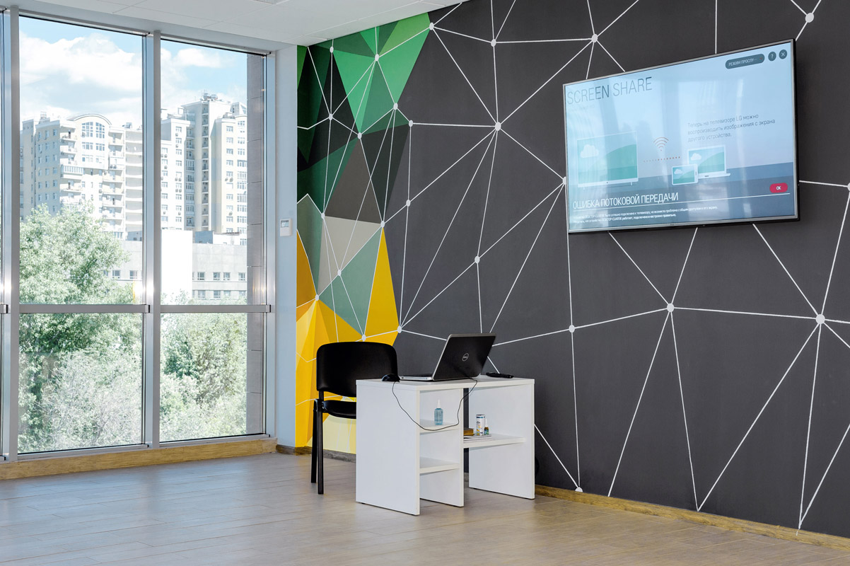 Semalt office interior with the signature geometric wall